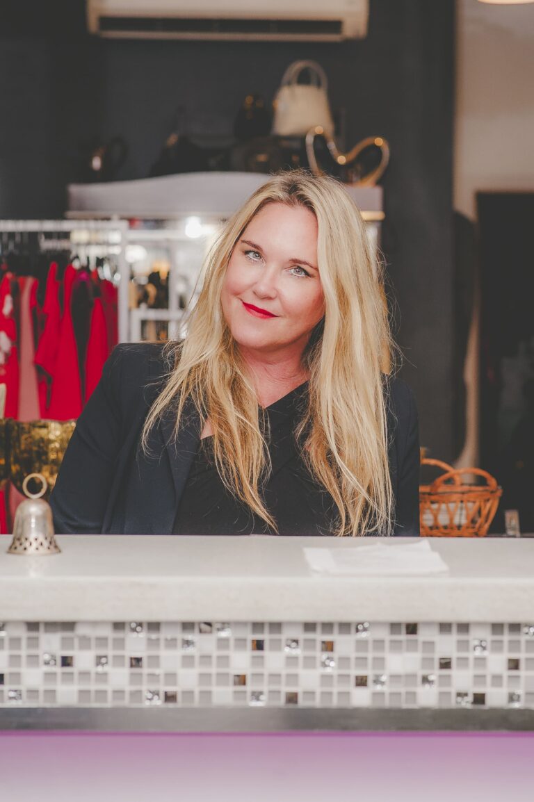 A close-up of Michelle Planche inside Loved & Found Boutique